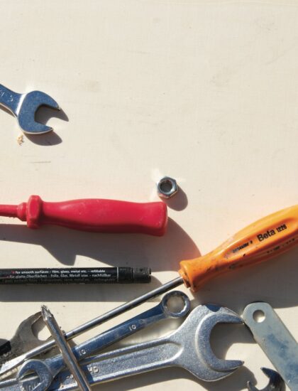 red and silver hand tool